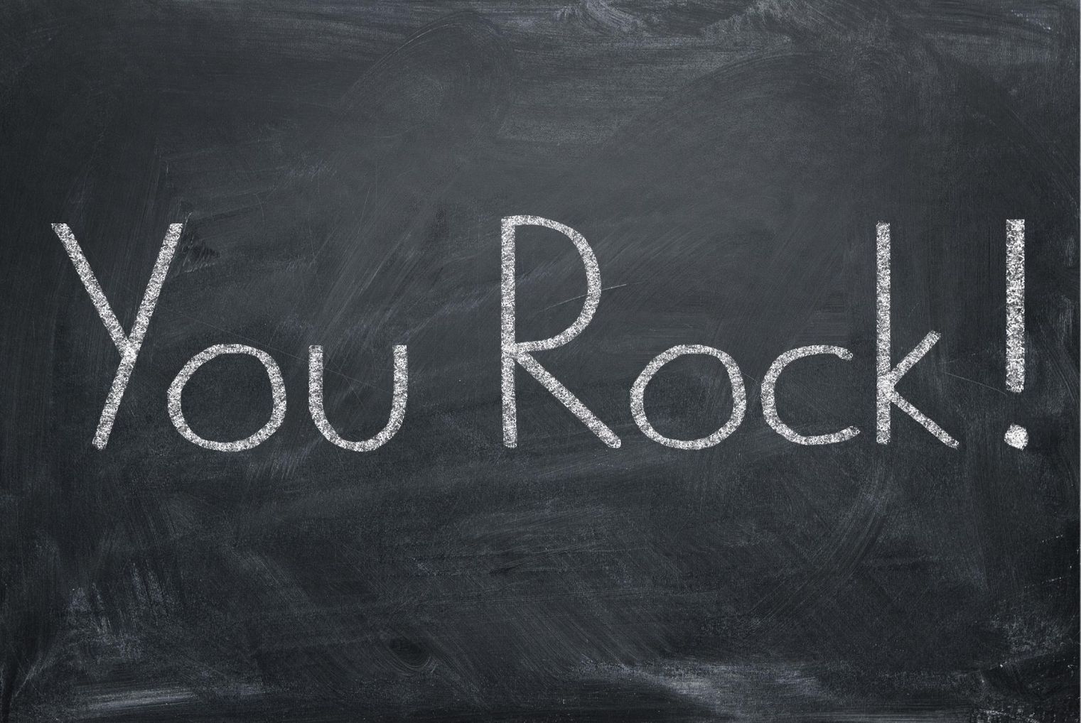 You rock written on blackboard. Love languages.