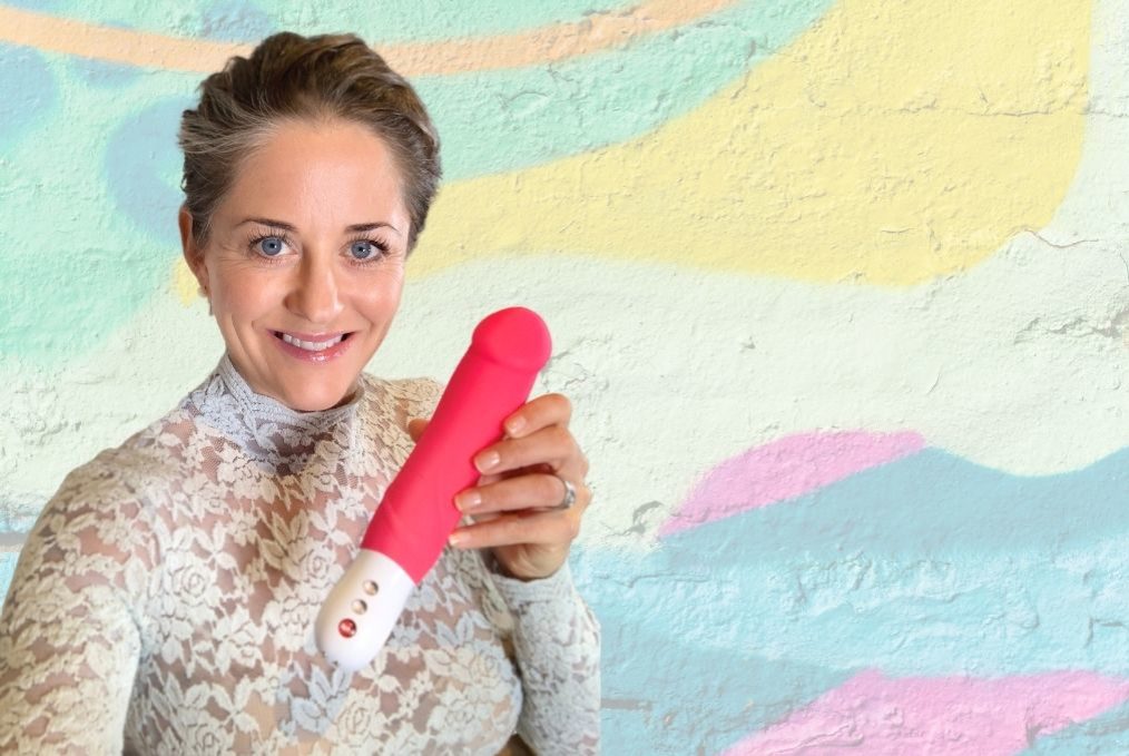 Elisabet Barnes Toy Tuesday, holding Fun Factory Big Boss Vibrator